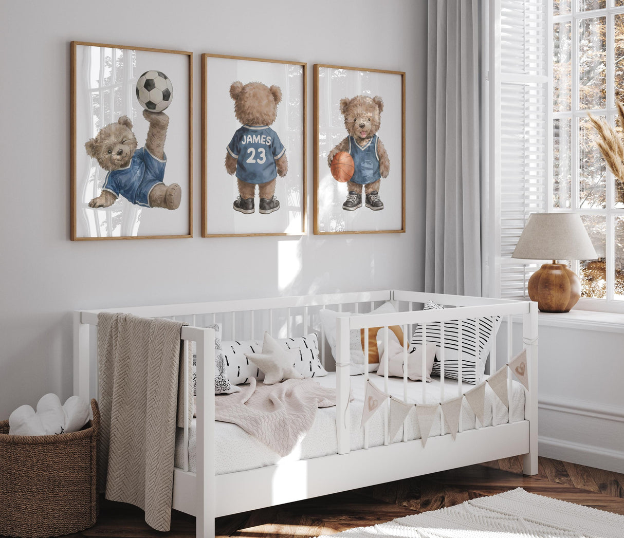 Sports bear prints displayed in baby boy nursery