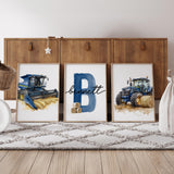Farm nursery prints displayed above a crib